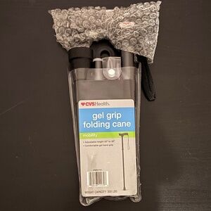 New CVS dark gray gel grip folding cane